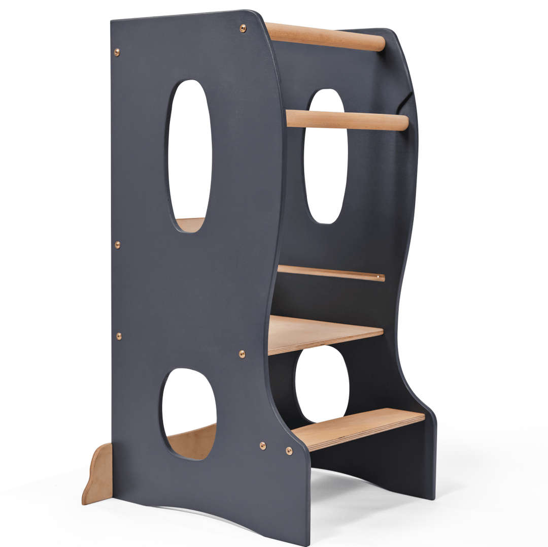 A gray Montessori tower with wooden elements and cut-out handles, designed to be stable and adjustable for children.